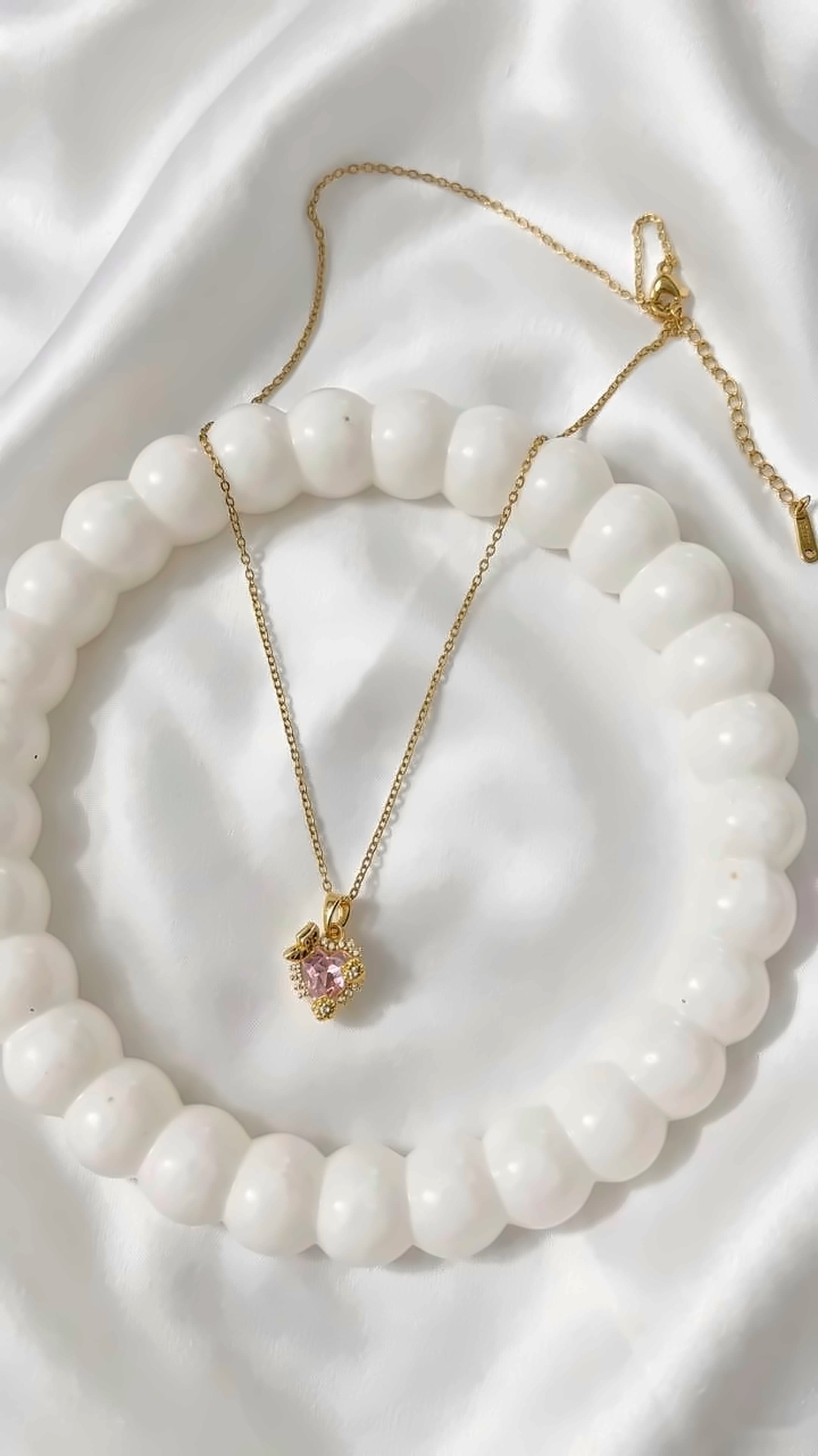 Faceted Pink Heart Crystal Halo Pendant Necklace (Golden Finish)