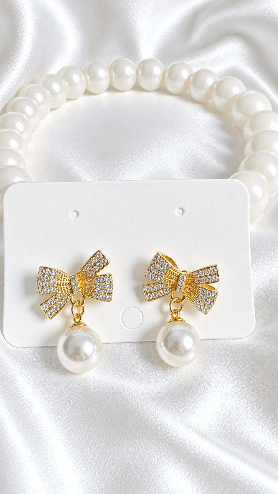 Crystal Bow & Lustrous Pearl Drop Earrings (Golden Finish)